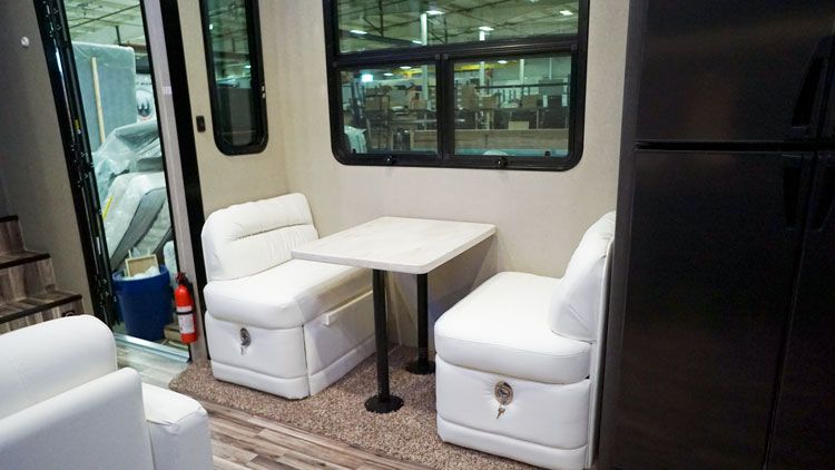 Weekend Warrior Toy Haulers Travel Trailers 5th Wheels Factory Toy Hauler 5th Wheel 4250w Dinette Bottom Storage Jpg Table Entertainment Fireplace